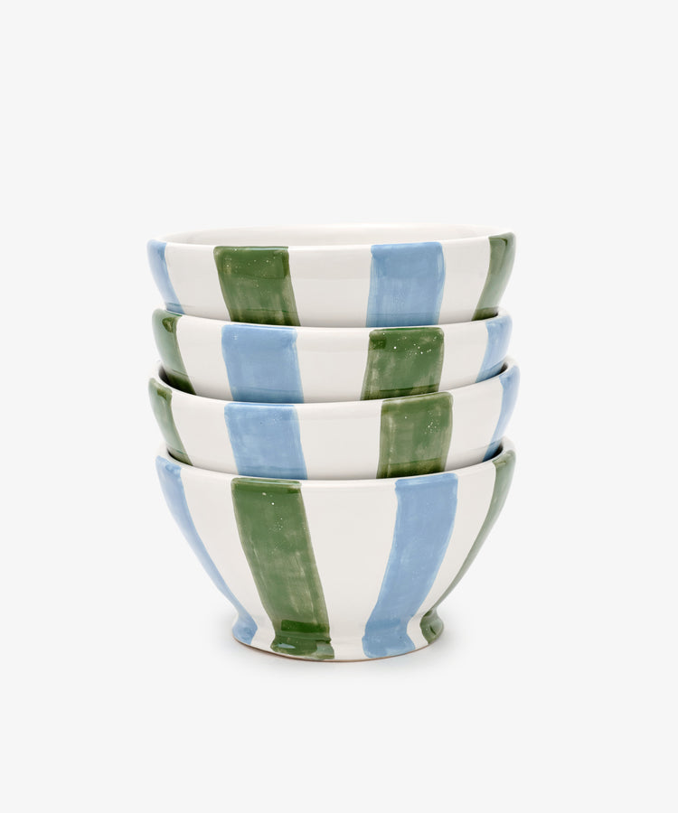 The Mina Bowl, Set of 4, features ceramic bowls with alternating green and blue vertical stripes stacked together, highlighting Mediterranean tableware style on a plain white background.