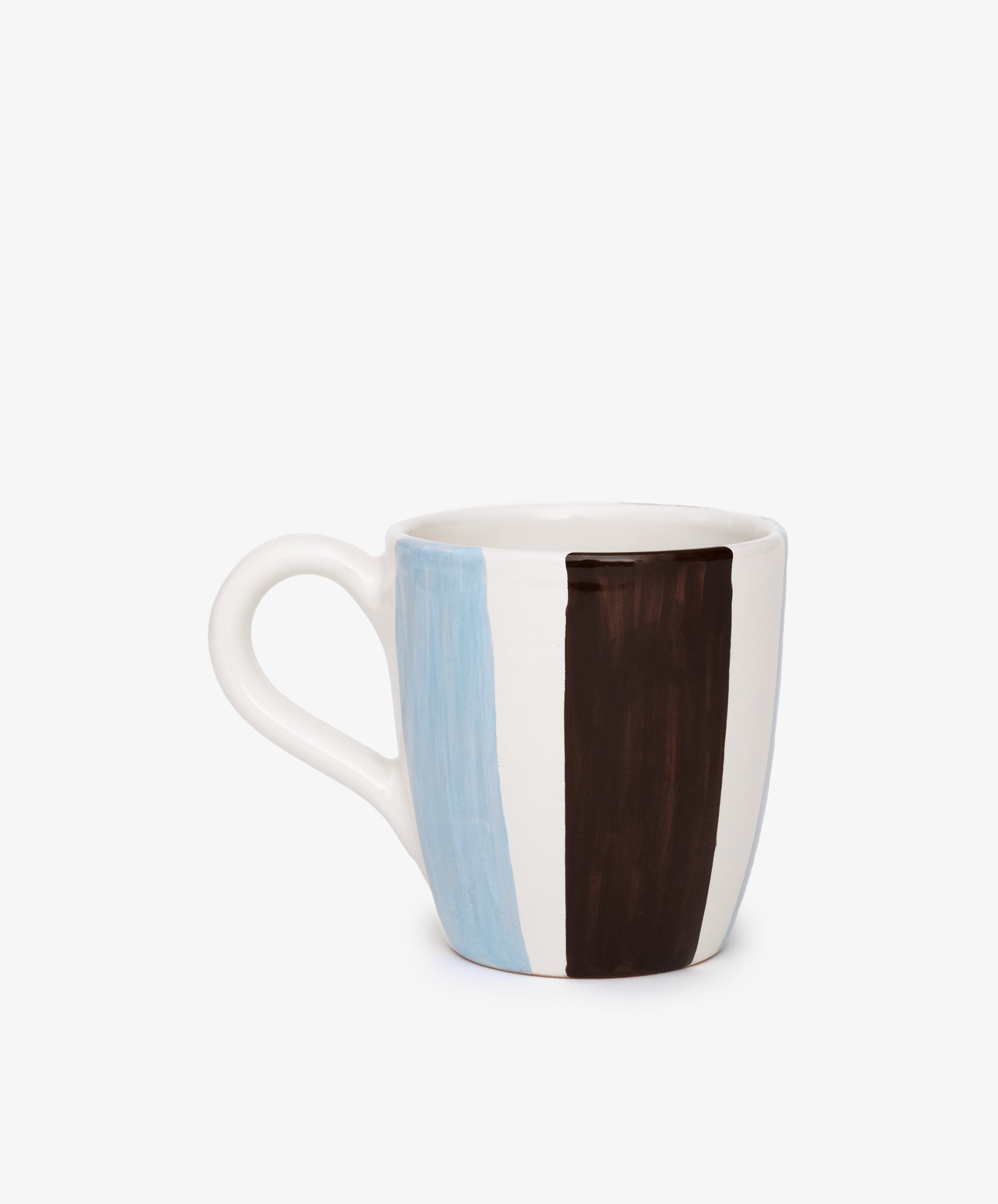 The Mina Mug is a unique ceramic piece with hand-painted vertical blue and brown stripes on white and a curved handle—an elegant addition to any collection.