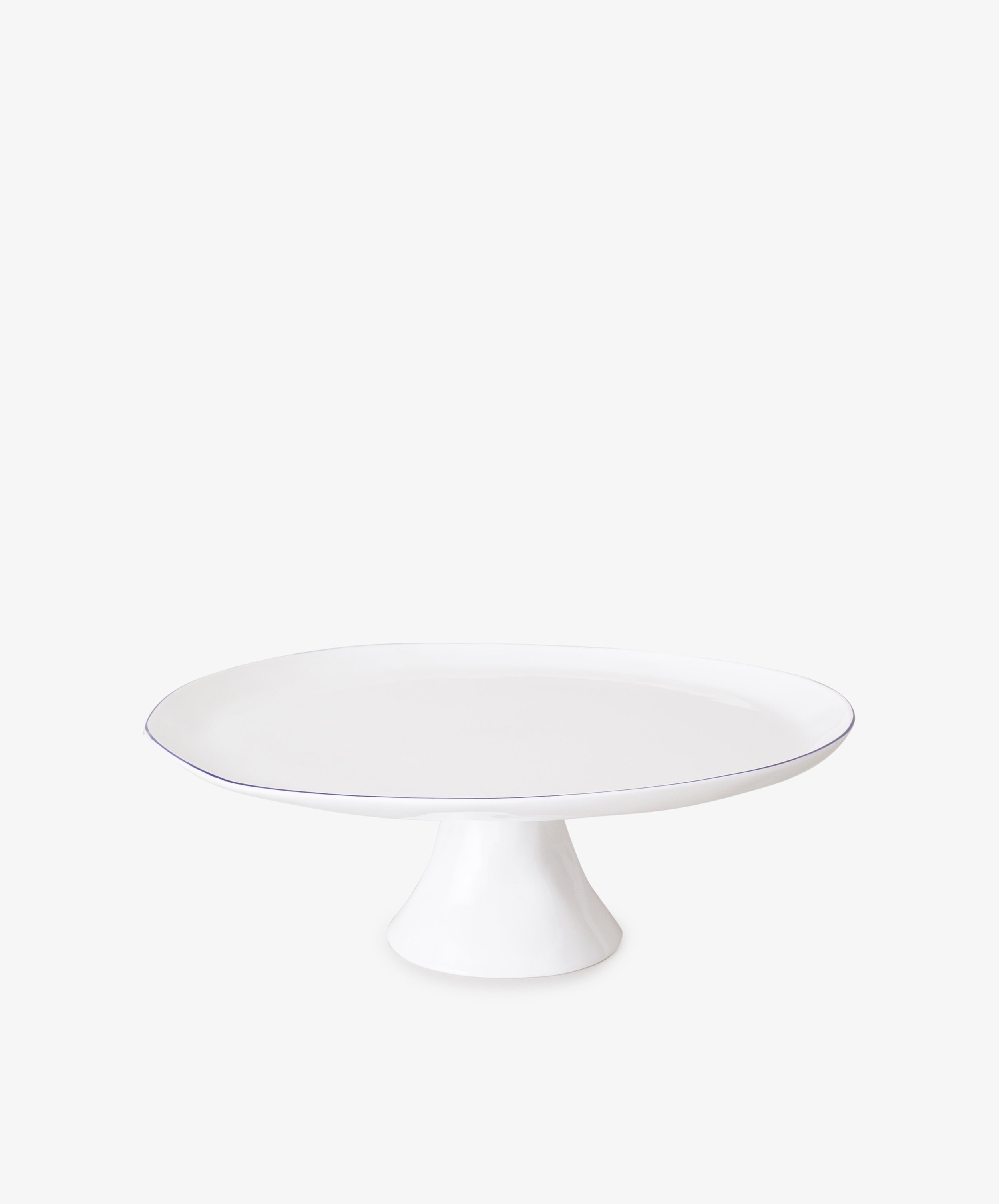 Cake Stand by Feldspar. White china fluted cake stand with thin blue painted border.