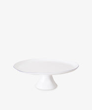 Cake Stand by Feldspar. White china fluted cake stand with thin blue painted border.