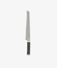 The Bread Knife, featuring a sharp serrated edge and a black and white striped handle, is displayed against a plain white background.