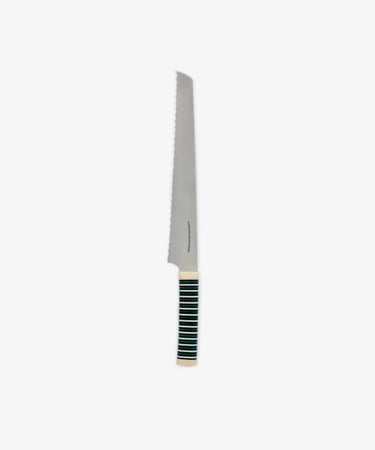 The Bread Knife, featuring a sharp serrated edge and a black and white striped handle, is displayed against a plain white background.