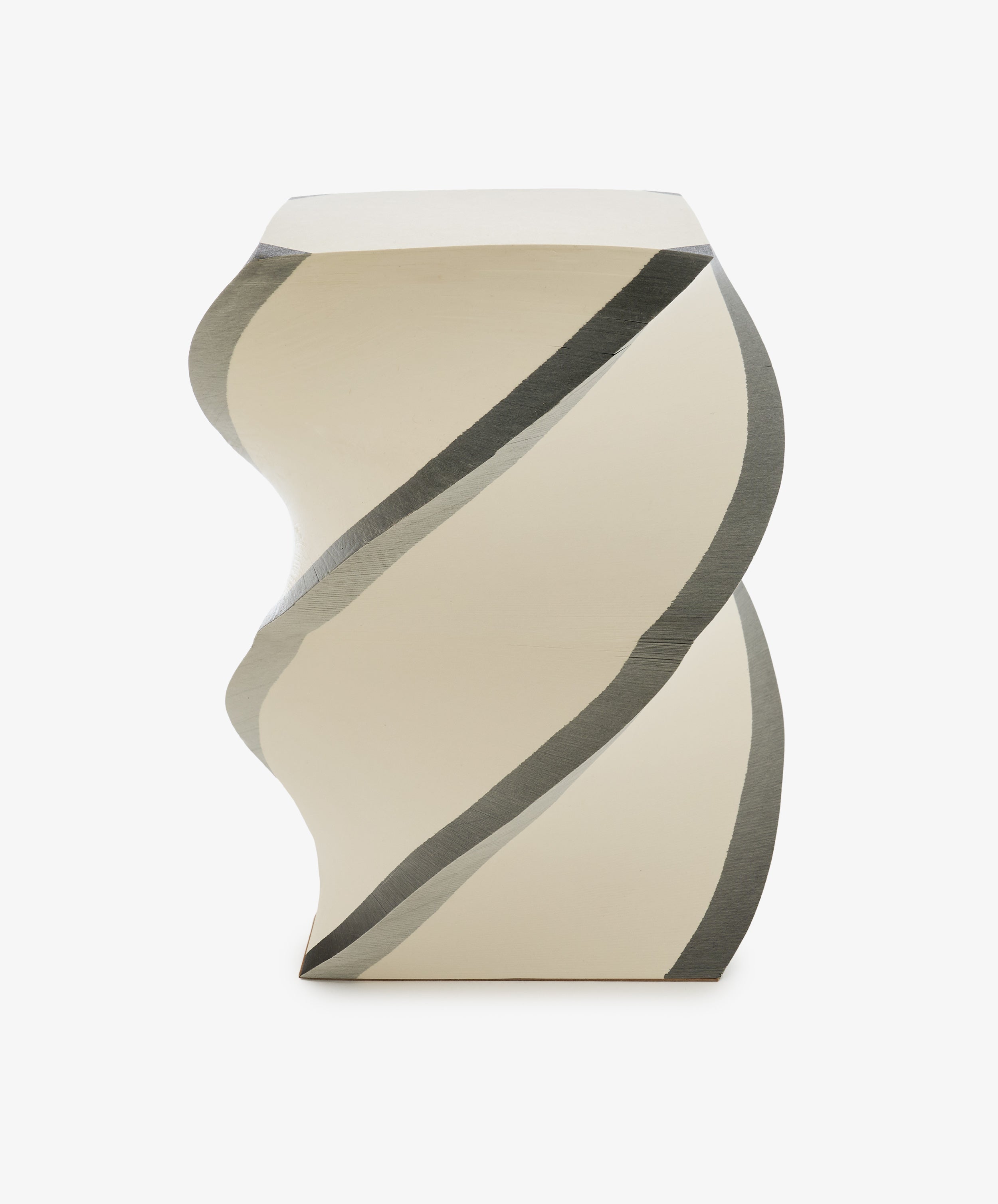 The Spiral Notepad is a beige, rectangular stool with a twisted, spiral design similar to a helix notepad and features dark gray accent lines on its sides.