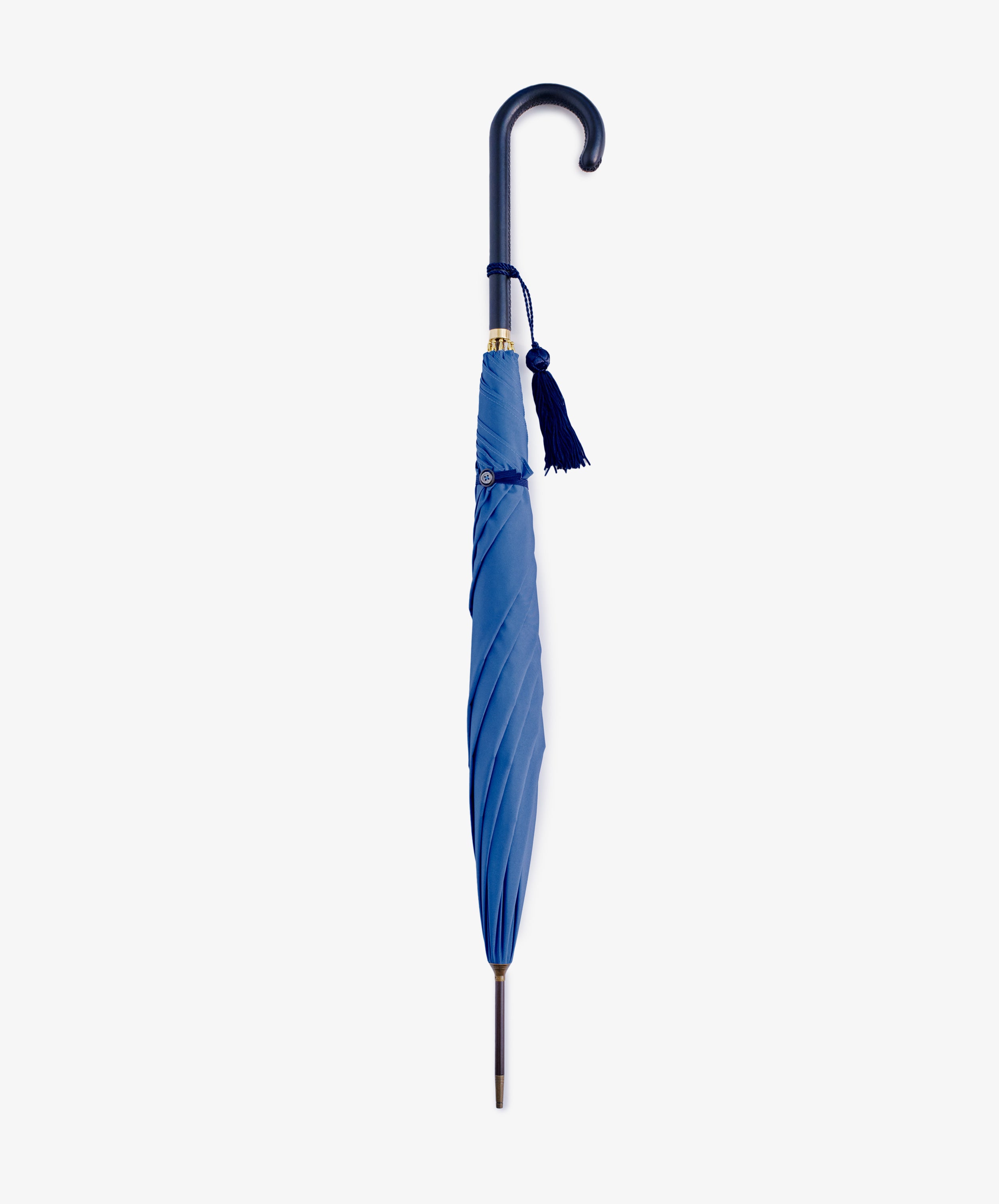 The Victoria Ladies Umbrella features a closed blue canopy, curved handle, and matching blue tassel, displayed against a plain white background.