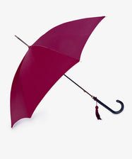 The Victoria Ladies Umbrella features a cherry bordeaux canopy, a curved black handle, and a decorative tassel, displayed against a plain white background.