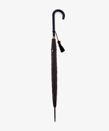 Victoria Ladies Umbrella with a curved leather crook handle and decorative tassel, shown closed against a plain white background.