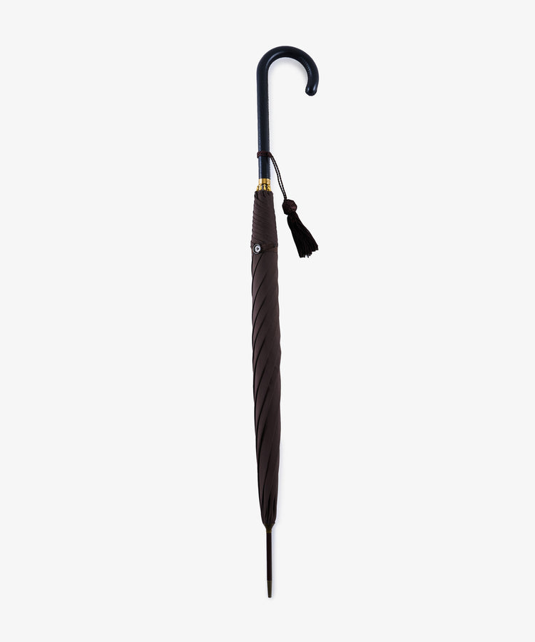 Victoria Ladies Umbrella with a curved leather crook handle and decorative tassel, shown closed against a plain white background.