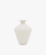 The Cirrus Bud Vase by Frances Palmer is a small, white ceramic piece featuring a wide body and narrow neck, shown against a plain white background.