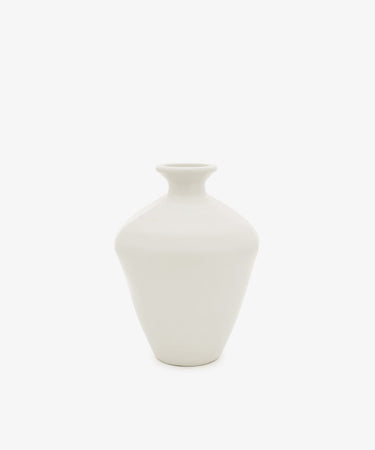 The Cirrus Bud Vase by Frances Palmer is a small, white ceramic piece featuring a wide body and narrow neck, shown against a plain white background.