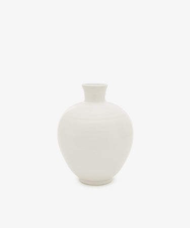 The Cirrus Bud Vase, featuring a white, round ceramic design with a narrow neck and wide body, is shown against a plain white background.