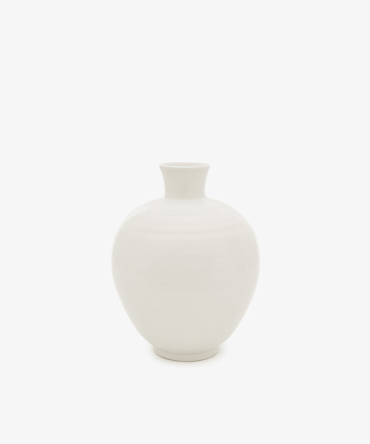 The Cirrus Bud Vase, featuring a white, round ceramic design with a narrow neck and wide body, is shown against a plain white background.