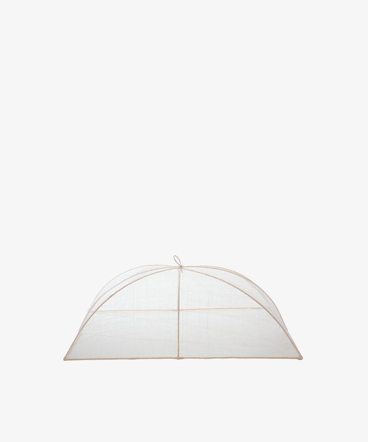 The Jacqueline Foodcover, made from natural abaca fiber in a translucent dome shape with a top loop, is displayed against a plain white background.