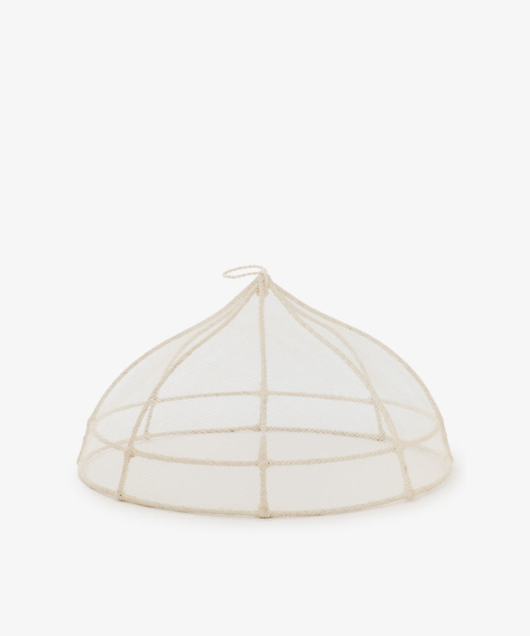 The Viola Foodcover is a handwoven mesh dome with a small loop handle, designed to protect food from insects—ideal for outdoor dining.