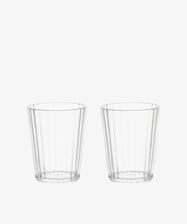 Two empty Fresco Tumblers with vertical ridges are placed side by side on a white background, highlighting the durable and sleek design of this set of 4 acrylic glasses.