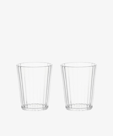 Two empty Fresco Tumblers with vertical ridges are placed side by side on a white background, highlighting the durable and sleek design of this set of 4 acrylic glasses.