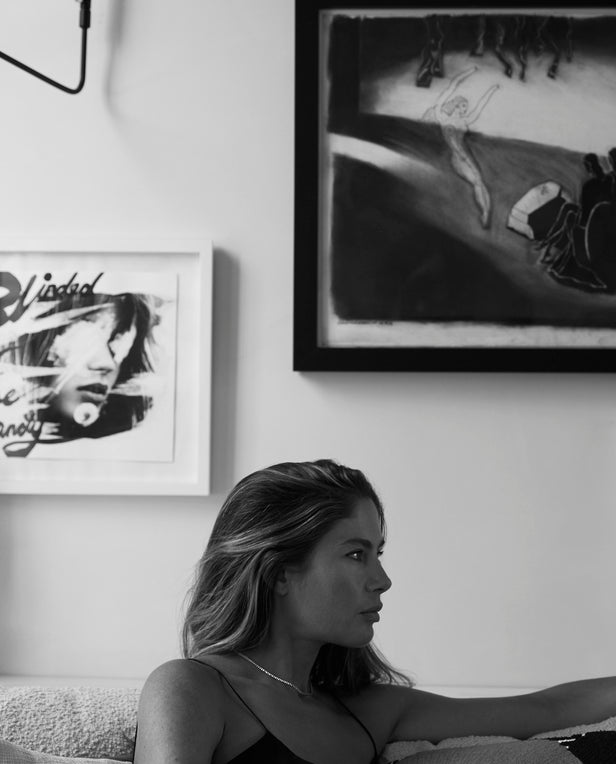 women sitting on couch