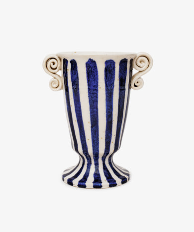 The Thallo Pedestal Vase by George Bronwin is a ceramic piece with cobalt stripes, a flared base, and two curled side handles, shown against a white background.