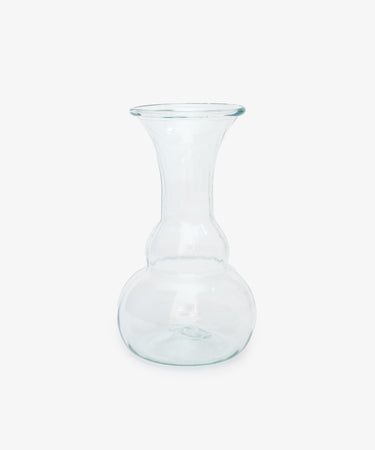 Carla Vase. Transparent hand-blown glass vase with fluted top edge and round bulb base.