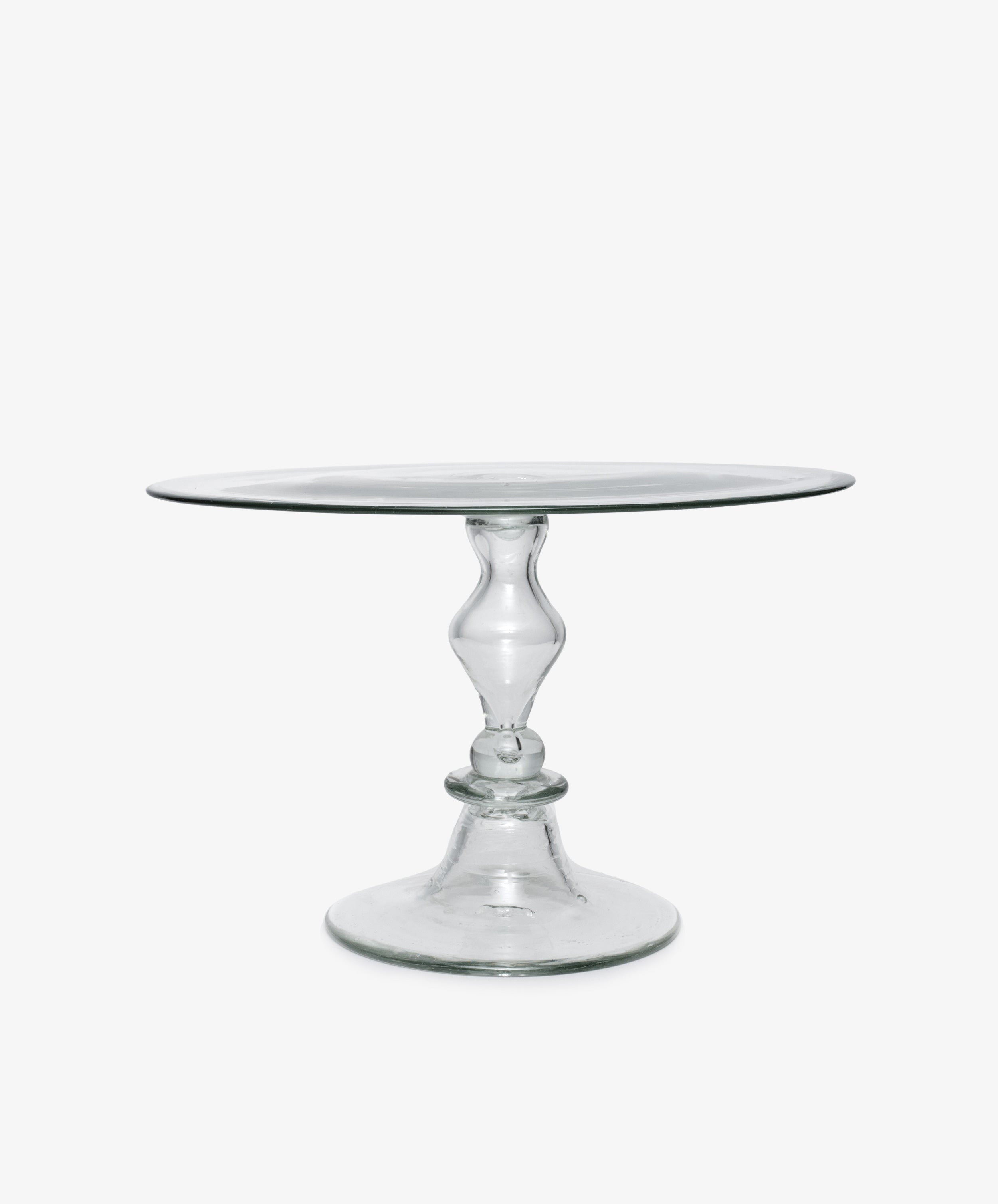 Isla Cake Stand. Clear hand-blown glass cake stand with decorative footed base.