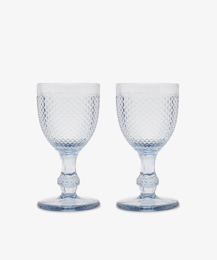 Celeste Red Wine Glass. Two transparent grey-blue stemmed wine glasses with diamond cut surface.