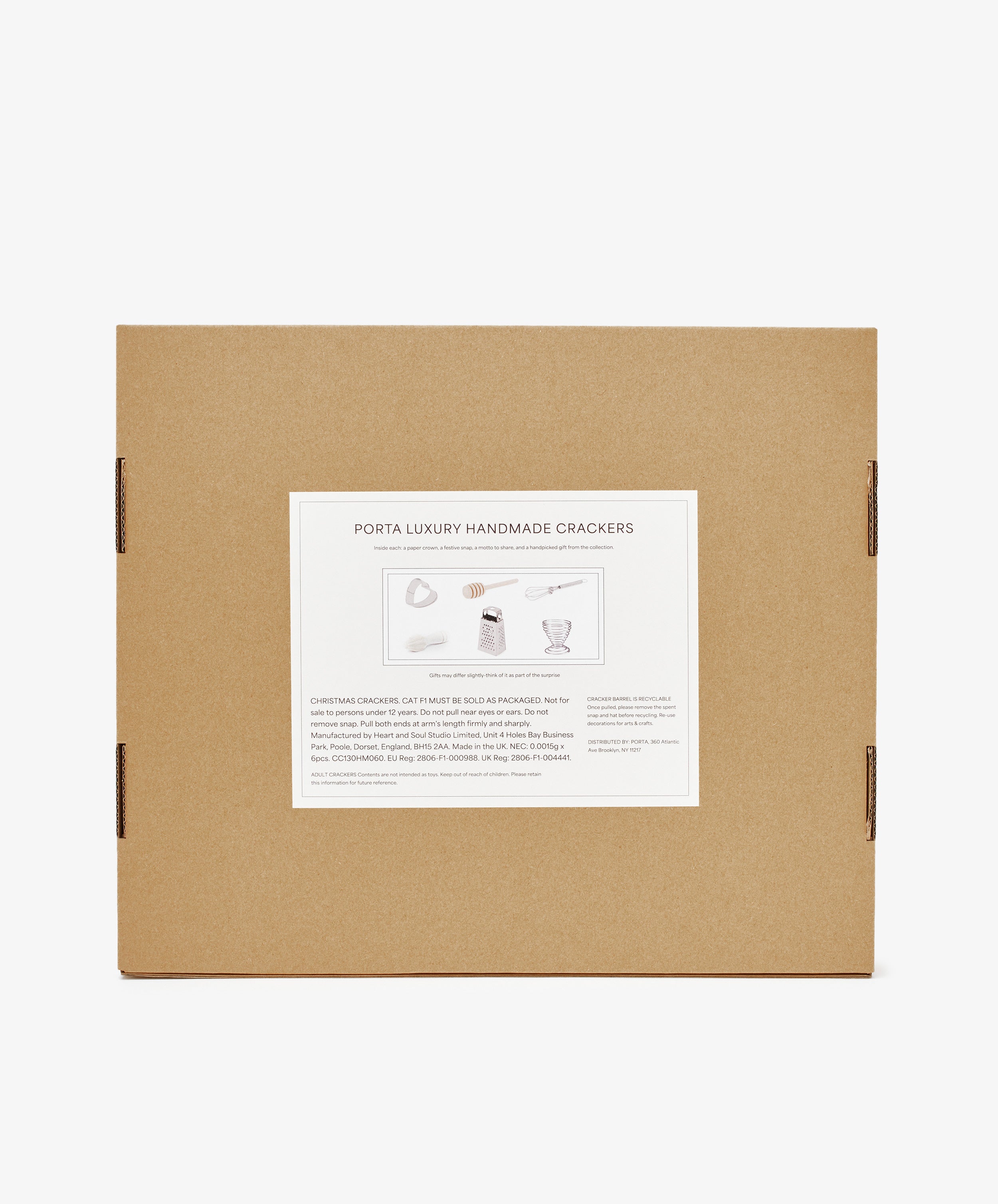 A brown cardboard box with a white label reading Capriccio Christmas Crackers, featuring product details and festive illustrations—ideal as holiday table crackers or Christmas party favors.