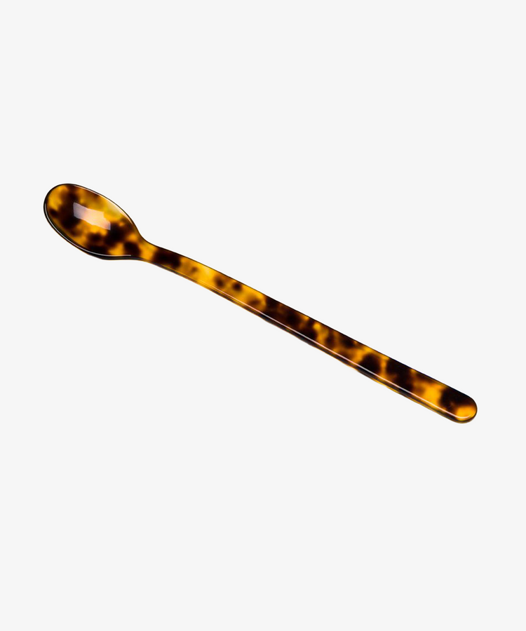 The Lungo Spoon features a long, narrow design with a tortoiseshell pattern—ideal for enjoying ice cream sundaes or stirring cocktails—displayed on a plain white background.