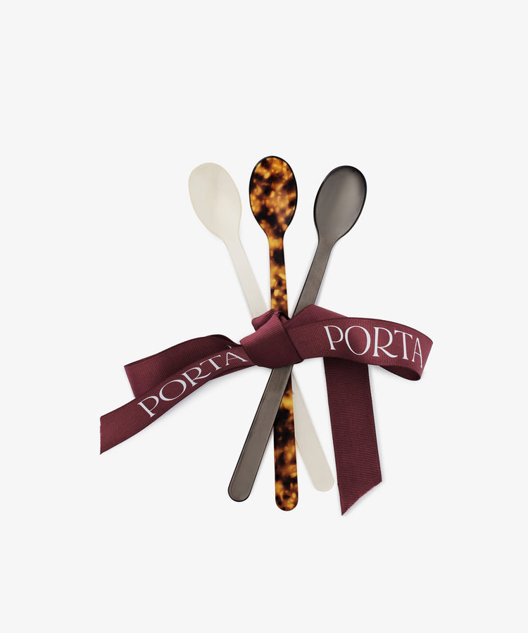 The Lungo Lot Bundle includes three small spoons in cream, tortoiseshell, and smoky gray, tied with a maroon ribbon featuring 