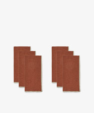 Six Corte Napkin, Set of 6 linen-cotton blend napkins are folded and arranged in two groups of three on a white background.