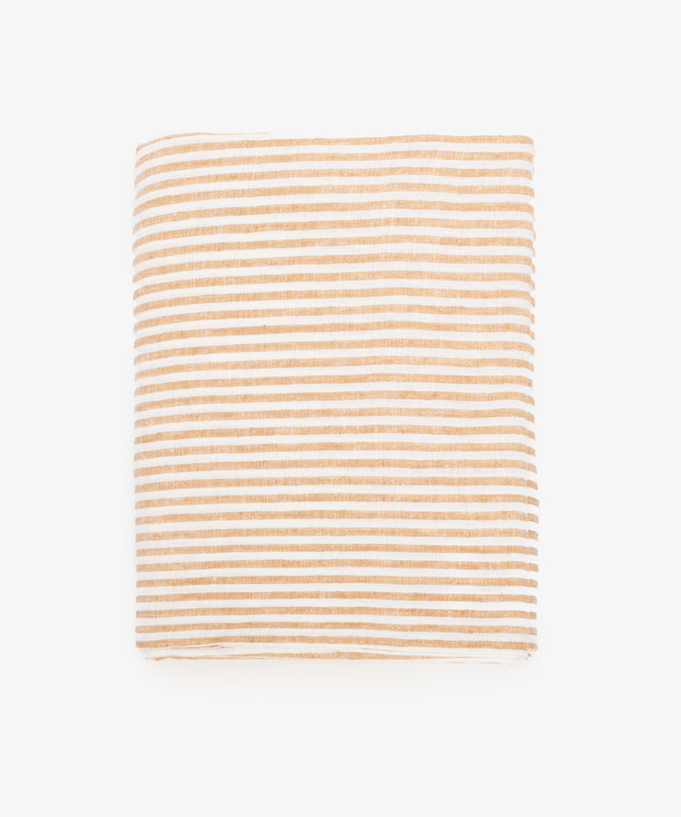 Vezzani Tablecloth. Rectangular cloth in orange and white striped linen.