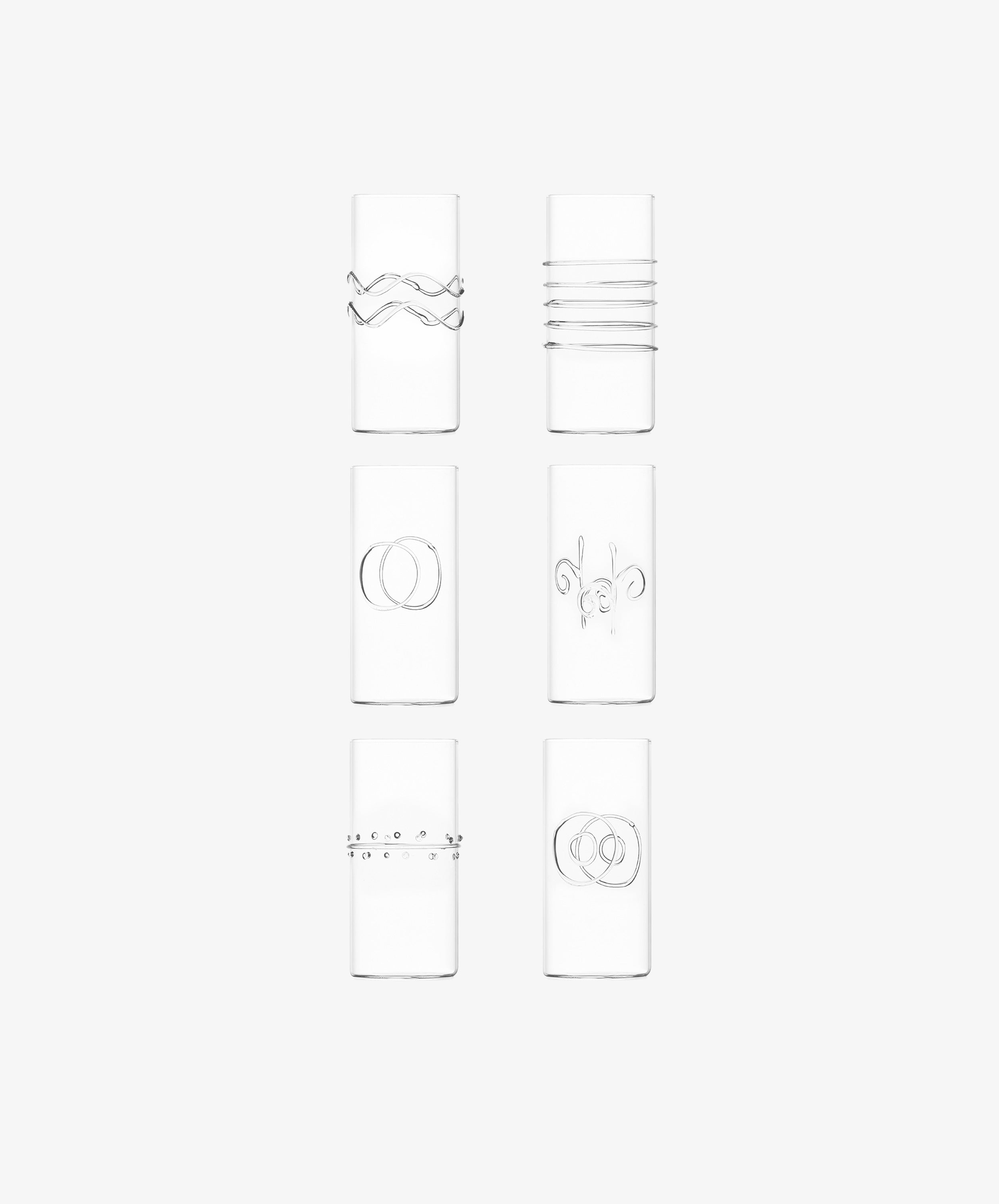 The Deco Tall Water Glass Set includes six clear glasses, each with a unique minimalist etched design—an elegant way to enhance your colorful glassware collection.