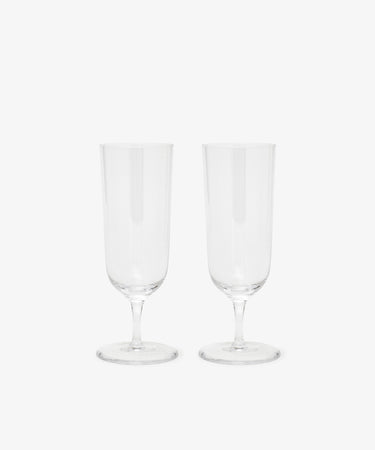 Two Venezia Champagne Flutes with elegant stems, placed side by side on a plain white background.