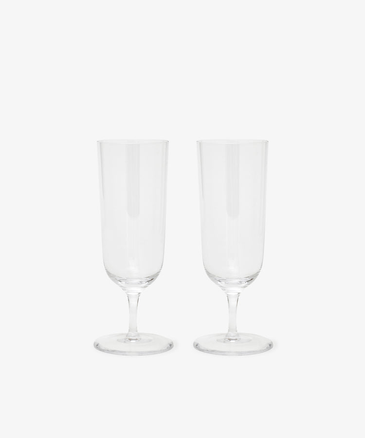 Two Venezia Champagne Flutes with elegant stems, placed side by side on a plain white background.