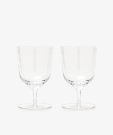 The Venezia Water Glass set of 6 features elegant, handblown clear glasses with short stems, displayed side by side on a plain white background—perfect glassware for any setting.