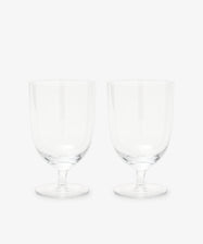 The Venezia Wine Glass, Set of 6 features elegant short-stemmed wine glasses displayed side by side on a plain white background, highlighting their clear and refined design.