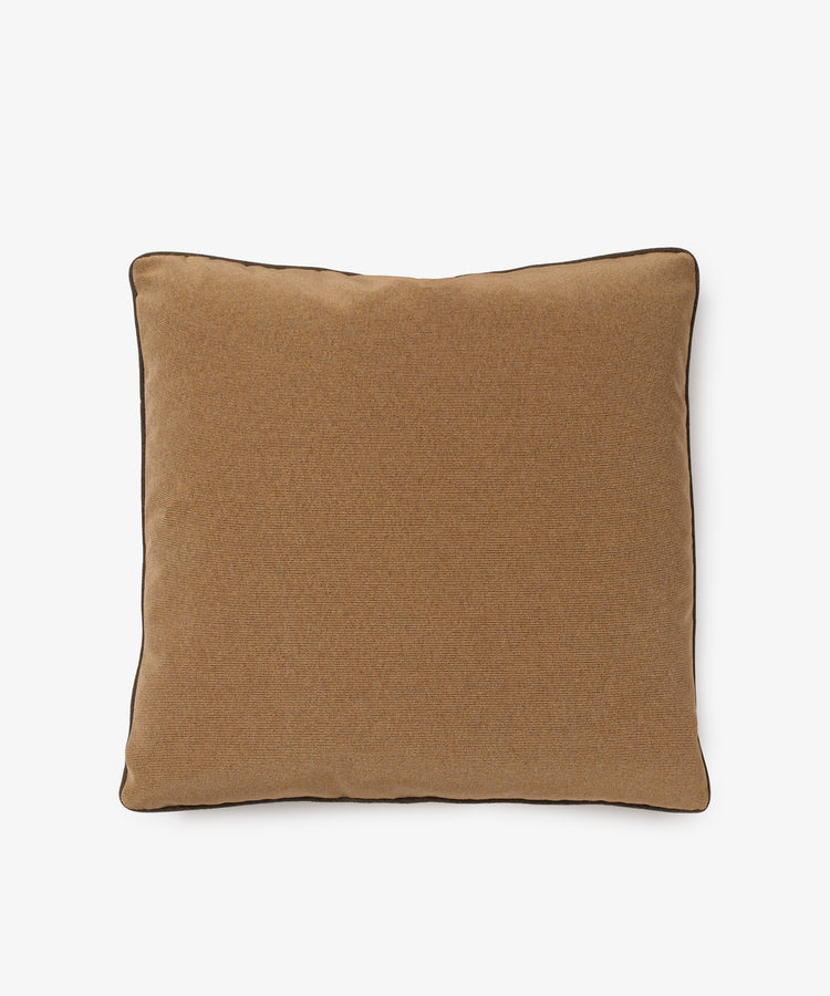 The Marco Square Cushion is a brown, square pillow with black-edged piping, handcrafted by a local upholsterer from premium deadstock fabrics and shown on a plain white background.