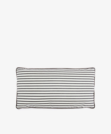 The Polo Lumbar Cushion features black and white horizontal stripes with dark edge piping, set against a plain white background. This limited edition designer piece adds a unique, stylish touch to any space.