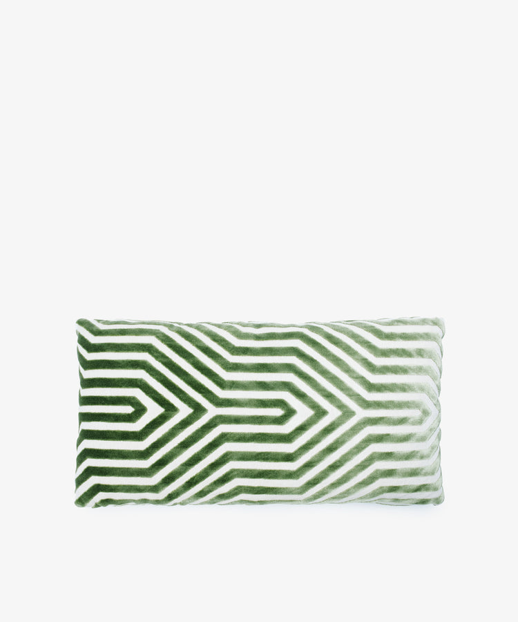 The Polo Lumbar Cushion is a rectangular pillow made from deadstock designer fabrics, showcasing a green and white geometric pattern on white. This premium cushion is available in limited quantities.