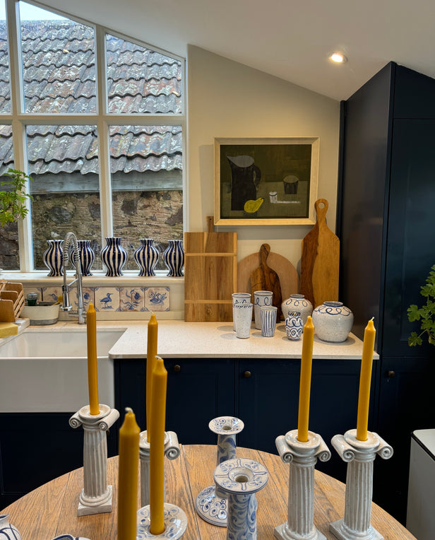 room with ceramic handle holders and vases