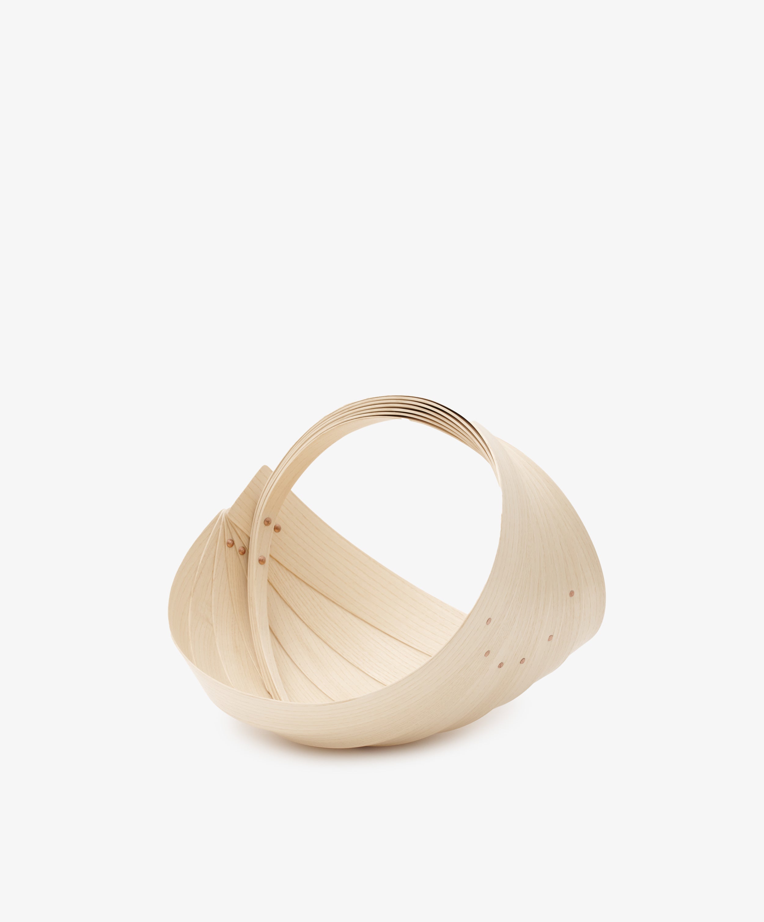 The Egg Trug by Jane Crisp. Bent light ash wood minimalist basket with rounded handle, alt view.