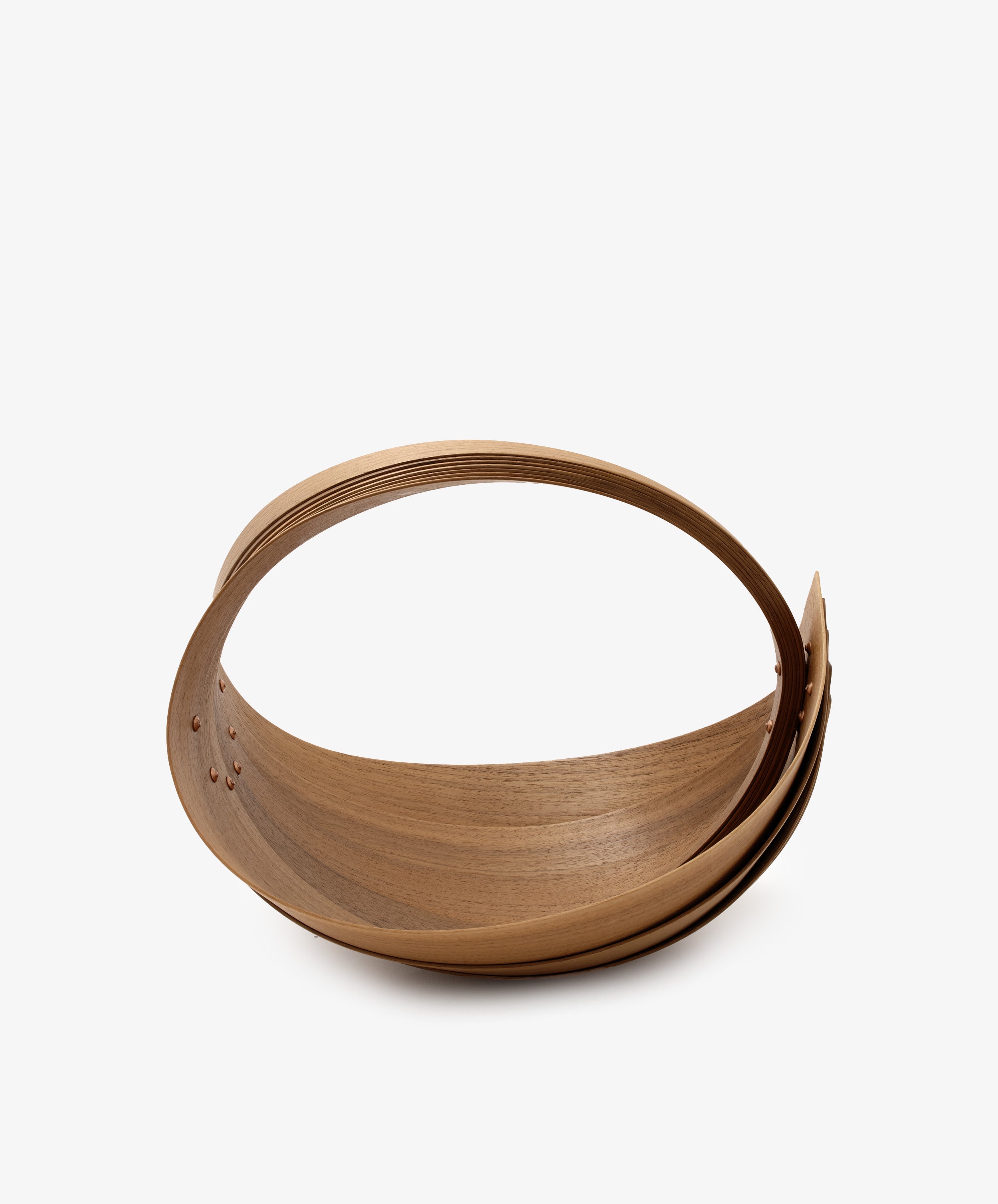 The Egg Trug by Jane Crisp. Bent walnut wood minimalist basket with rounded handle. 