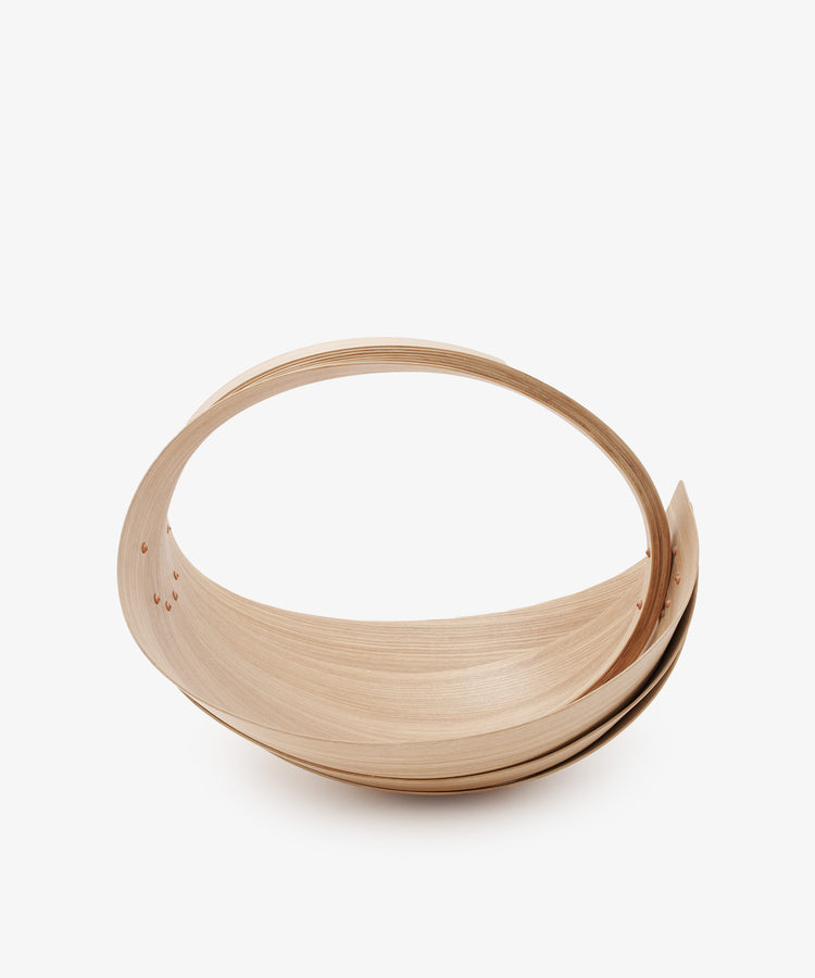 The Forager Trug by Jane Crisp. Bent light olive wood minimalist basket with rounded handle. 