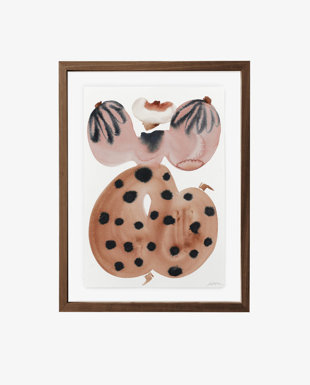 Framed artwork of abstract shapes with black and brown patterns on a white background