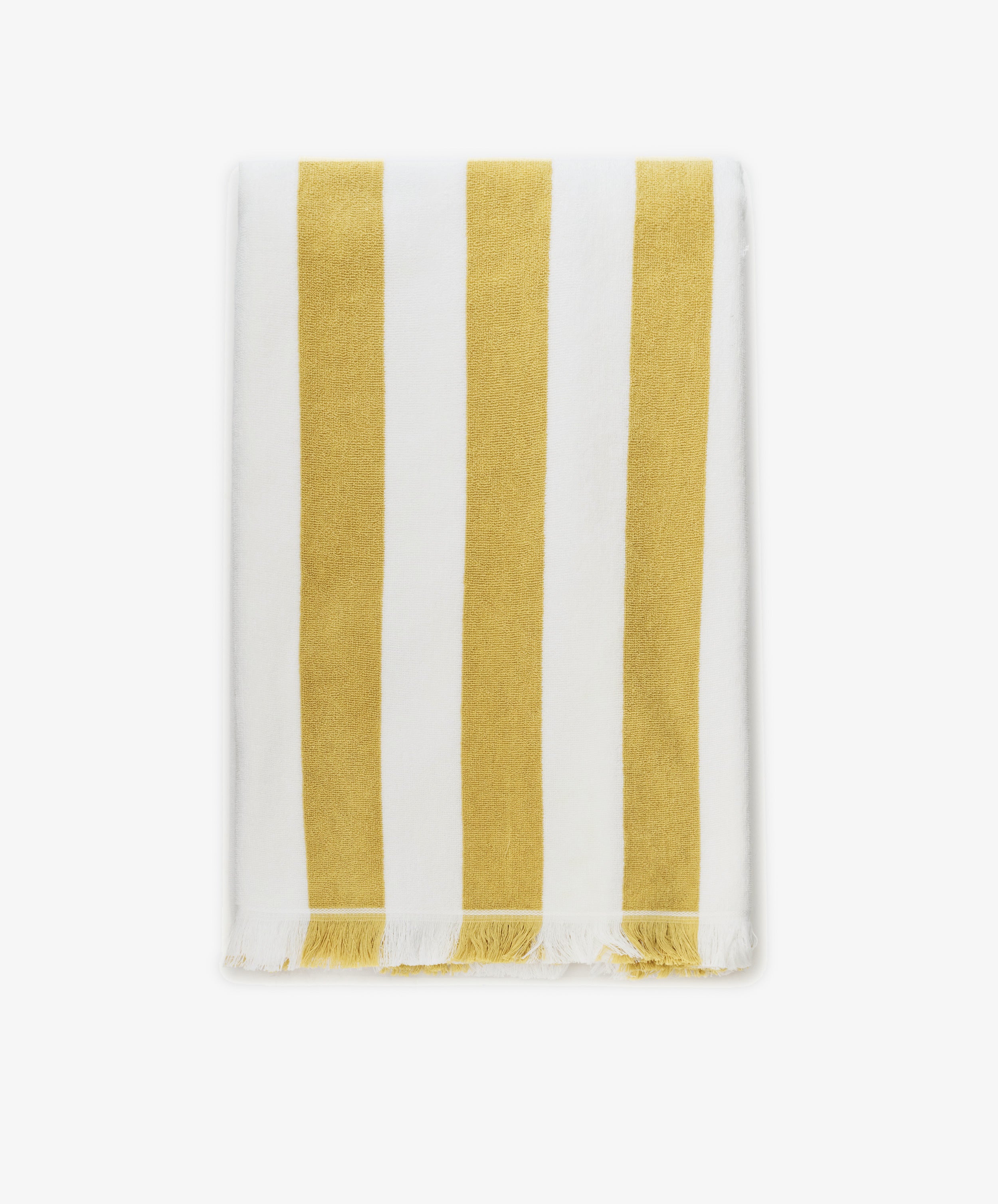 The Citrino Stripe Towel is a rectangular Italian beach towel featuring vertical yellow and white stripes with tasseled edges, shown neatly folded on a white background.