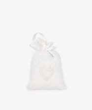 The Lavender Sachet is a white fabric bag with heart-shaped Viana do Castelo embroidery, tied with a satin ribbon—perfect for lavender, handmade in Portugal and shown against a plain white background.