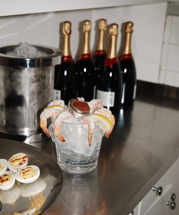 shrimp cocktail on steel counter
