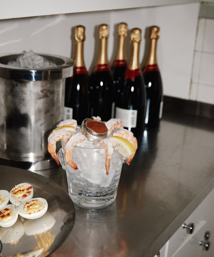 shrimp cocktail on steel counter