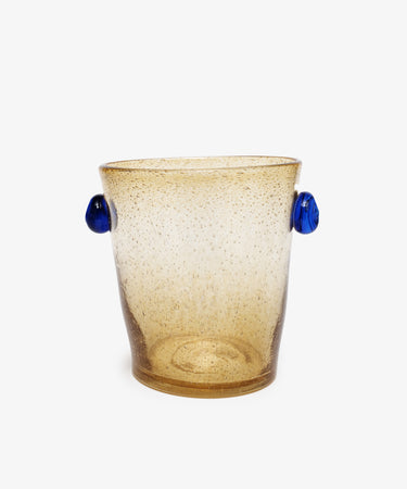 Vincent Vase/ Ice Bucket by La Romaine Editions. Handblown bubble glass vessel in amber with blue knob handles.