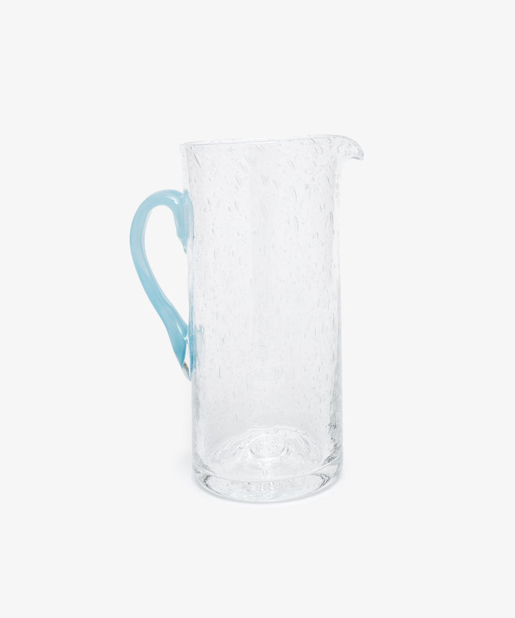 Pauline Jug by La Romaine Editions. Hand-blown clear glass pitcher with light blue handle, alt view.