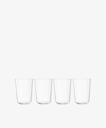 A set of four Arc Tumblers, made from lead-free glass, are displayed in a row against a plain white background, highlighting their versatility for any occasion.