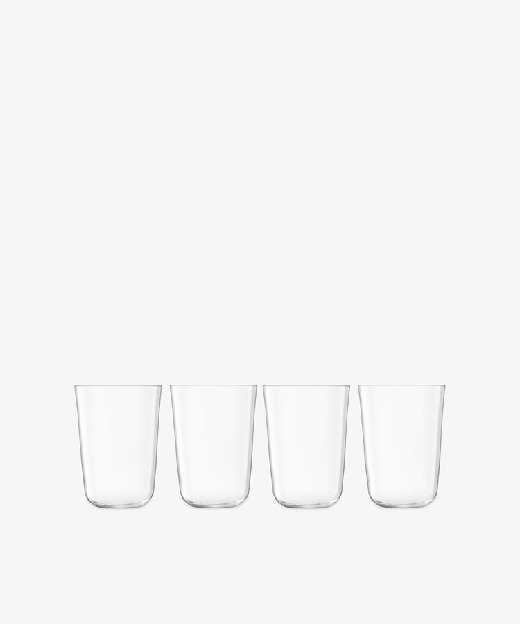 A set of four Arc Tumblers, made from lead-free glass, are displayed in a row against a plain white background, highlighting their versatility for any occasion.
